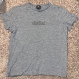 H&M men’s small grey tee shirt. “Realite” logo on front.